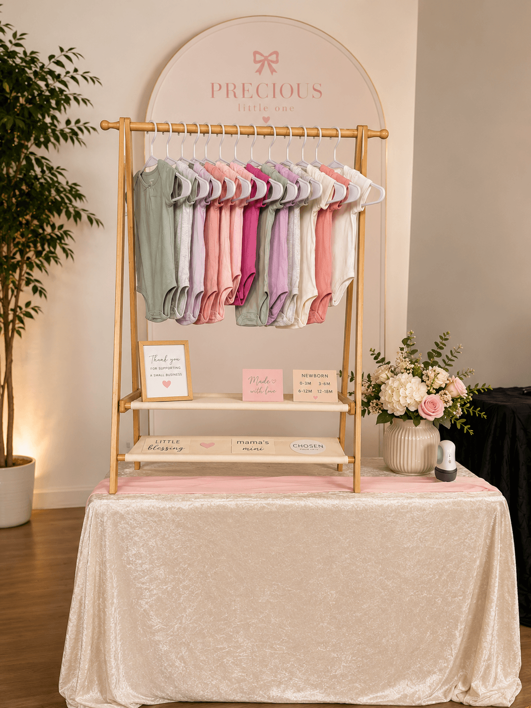 Interactive baby shower onesie station