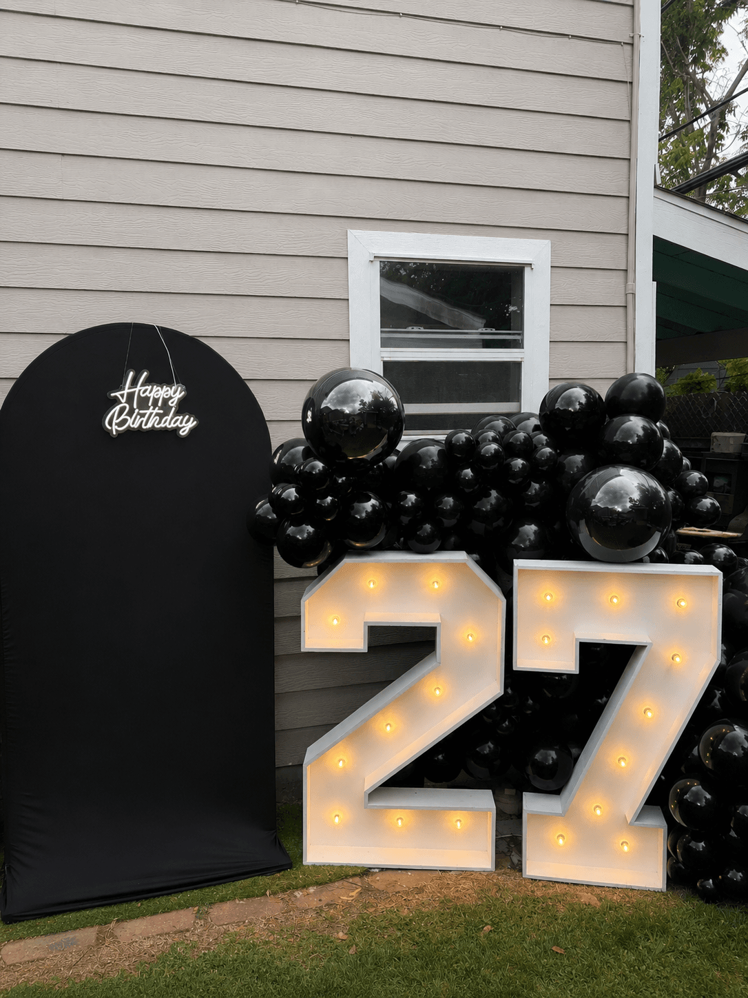 Marquee numbers displayed with balloons